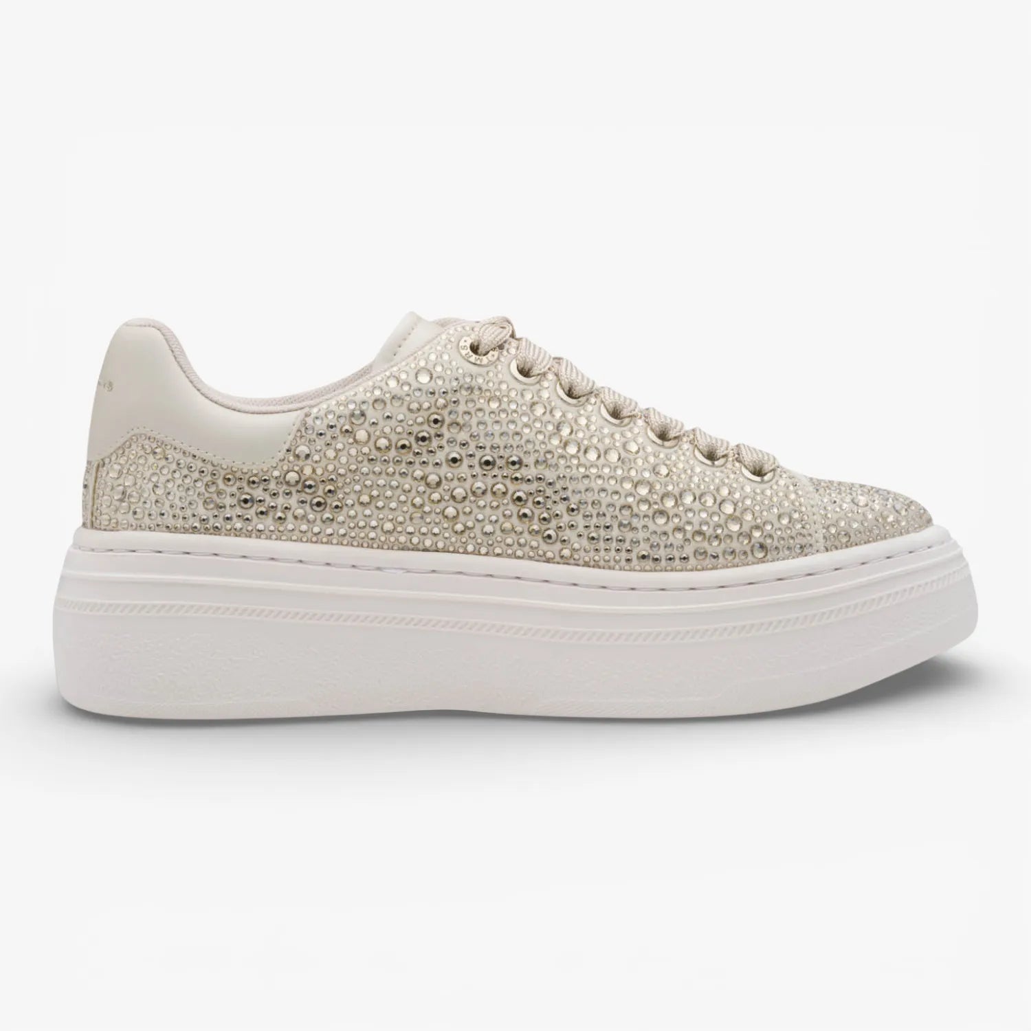 Beige sneaker with pearl embellishments on a white background