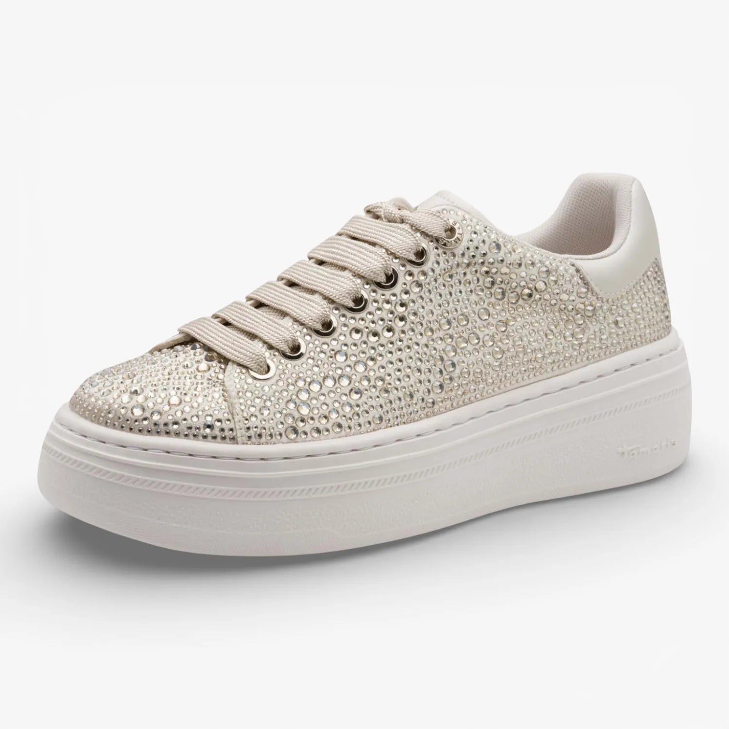 Beige sneaker with rhinestone embellishments on a white background