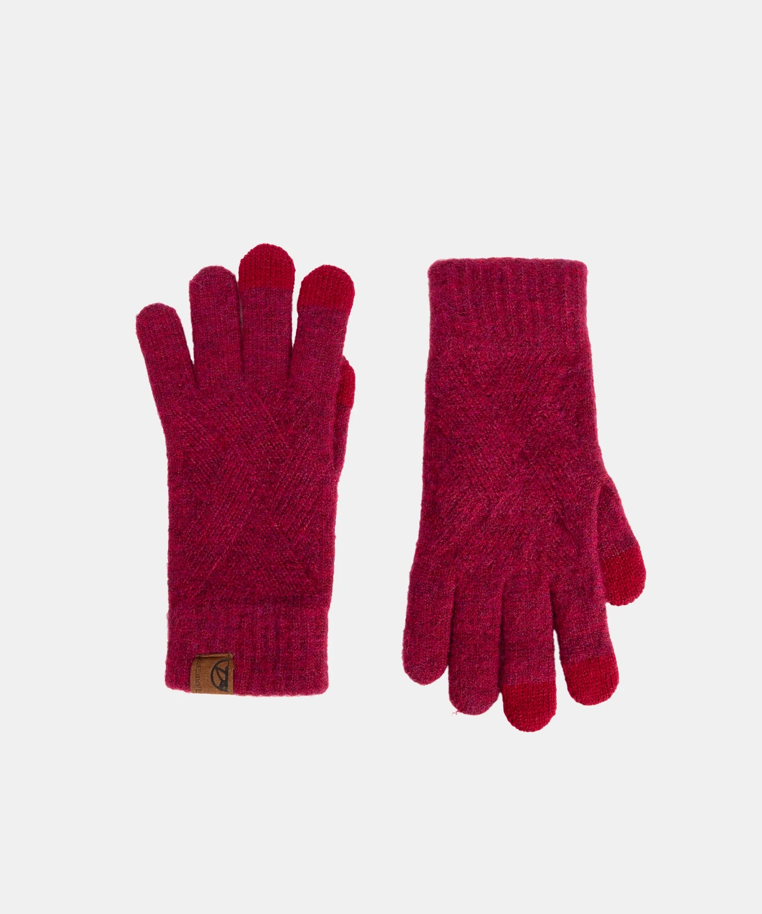 Pair of red gloves on a light gray background