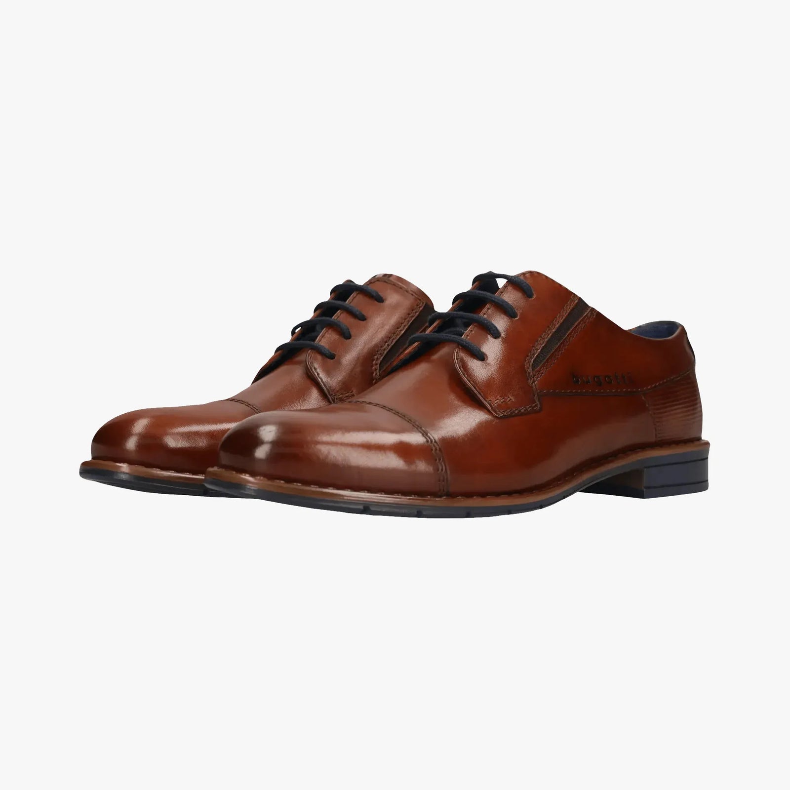 Pair of brown leather dress shoes on a white background