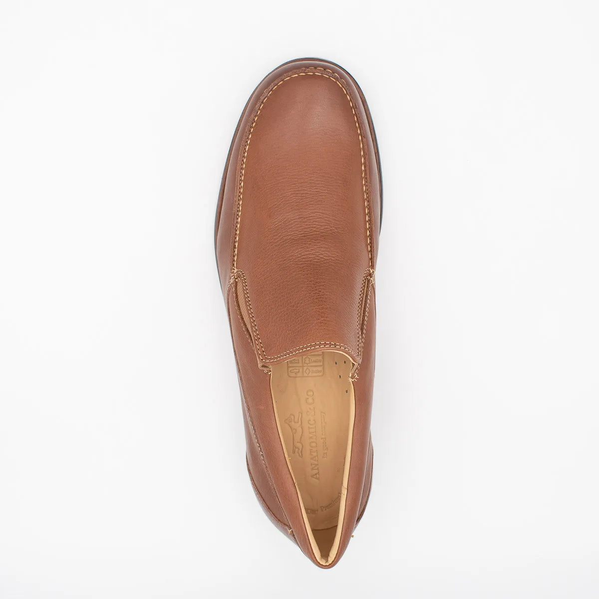 Brown loafer shoe on a white background