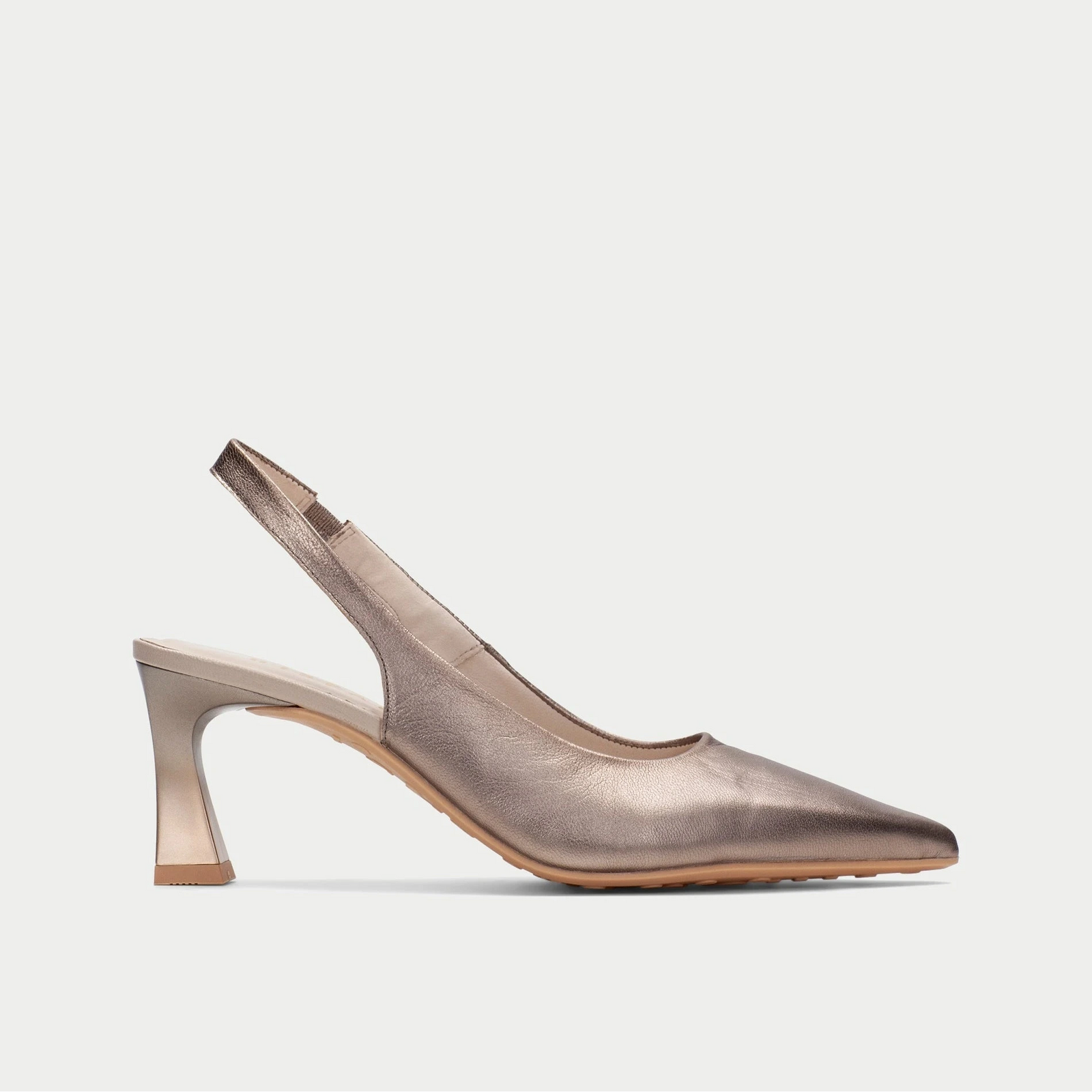 Black pointed-toe slingback pump with a small silver buckle on a white background