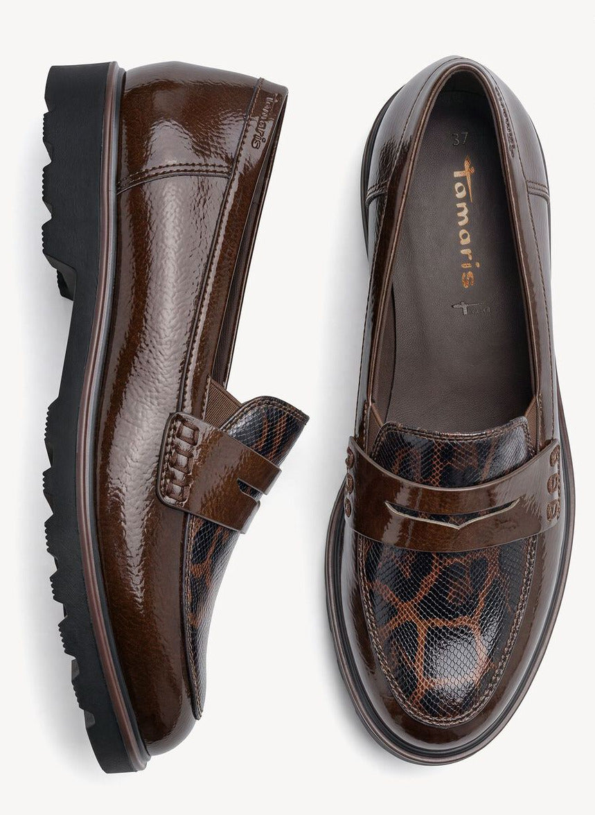 A pair of brown leather penny loafers with a glossy patent finish and a brown snakeskin-patterned toe cap, shown from top and side angles on a light gray background.