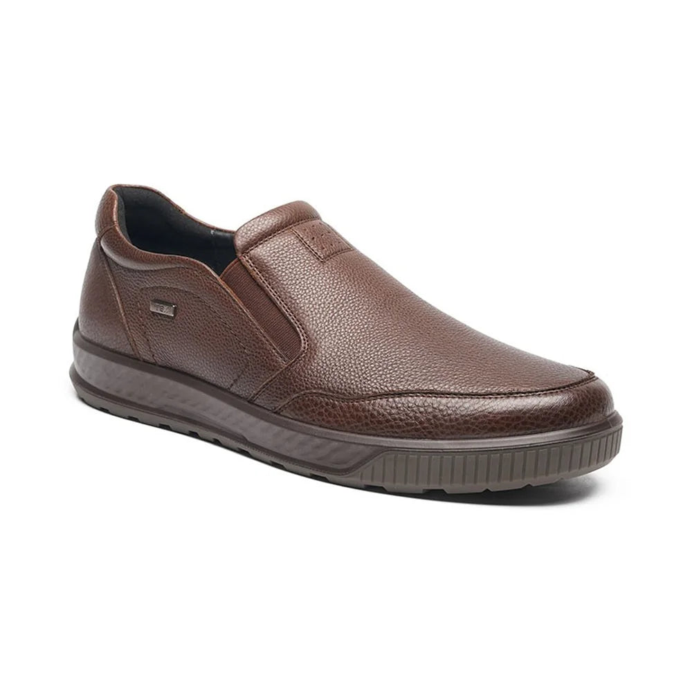 G-Comfort A-951 men's tan-cognac leather slip-on shoe shown at a three-quarter angle.