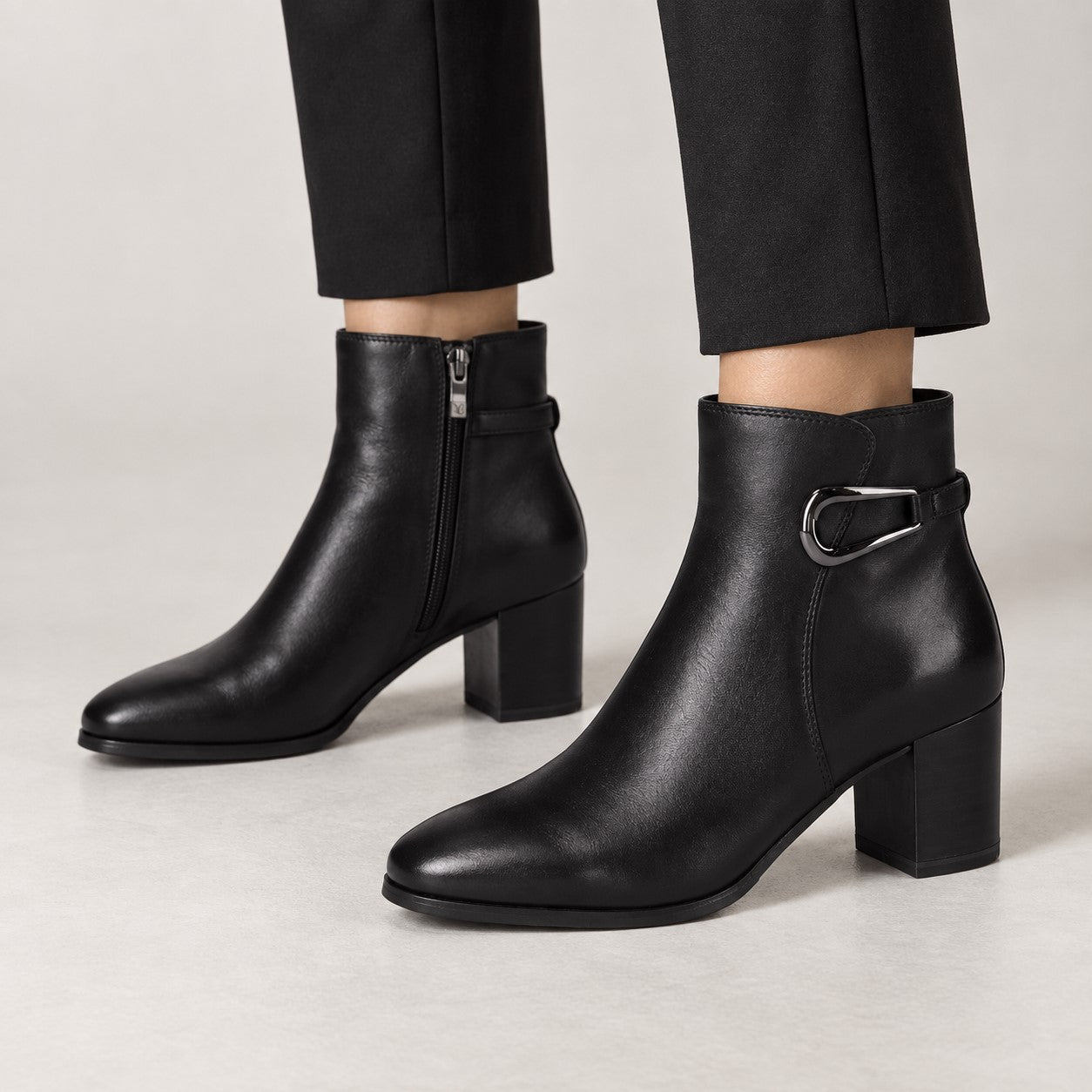 Caprice black leather ankle boots with silver-tone buckle details and block heels