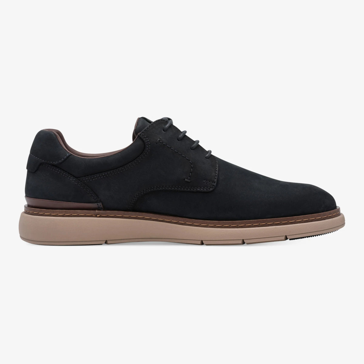 Opposite side of the Tamaris navy leather shoe, showing the contrast sole and heel trim.
