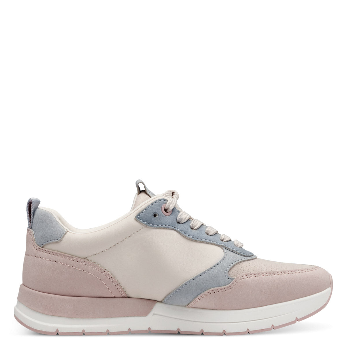  Interior view of Tamaris pastel sneaker, highlighting the textile decksole and unlined structure.