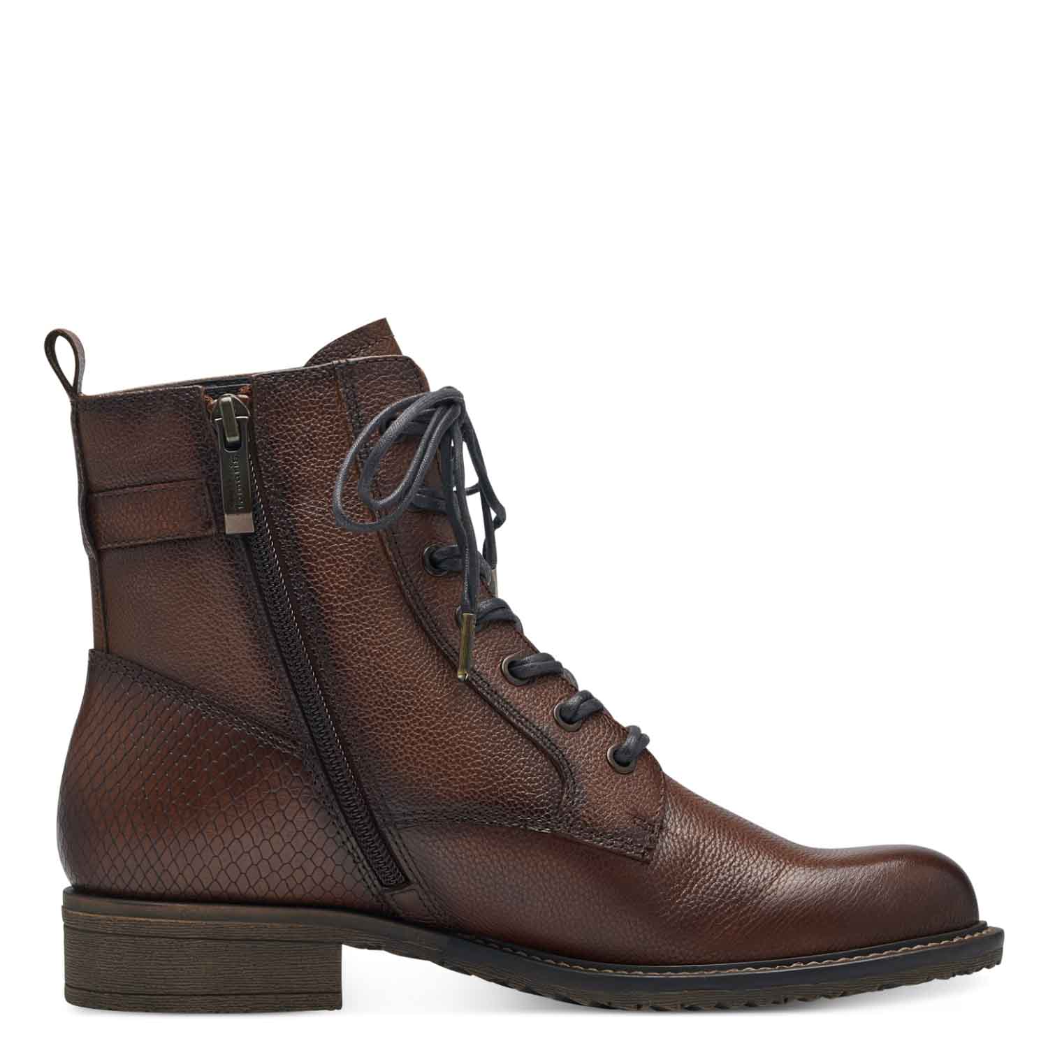  Side view of the inside of the brown lace up boots, highlighting the zipper detail.