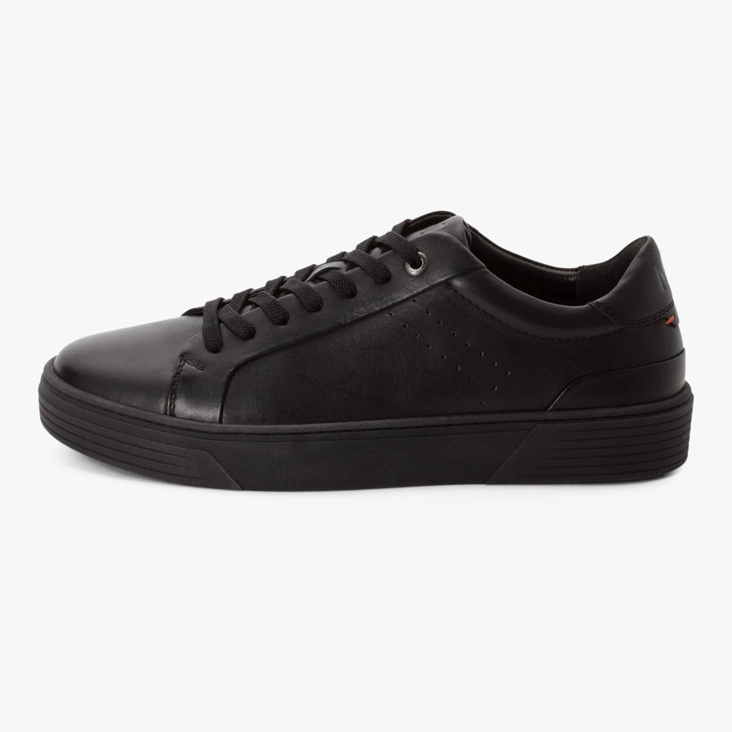 Outer side of the Marco Tozzi men's black leather trainer, showing the subtle perforations.