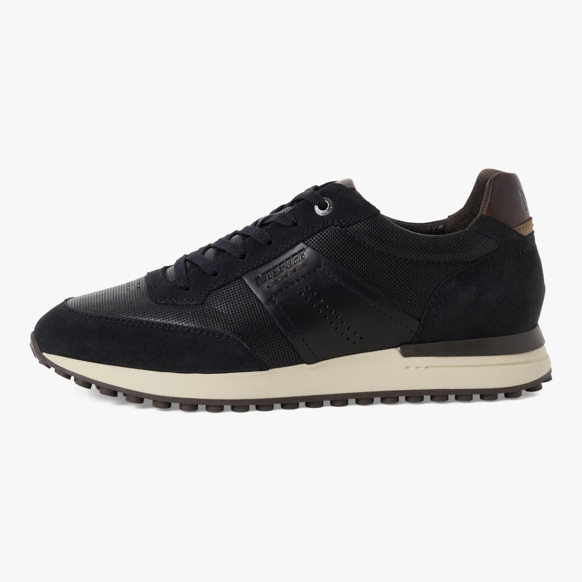 Outer side of the Marco Tozzi navy leather trainer, showing the tonal panels and cream sole.