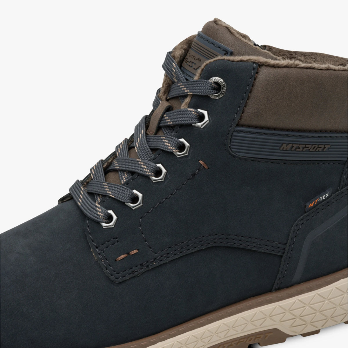Close-up of the lacing, navy panels and brown collar on the Marco Tozzi wide fit boot.