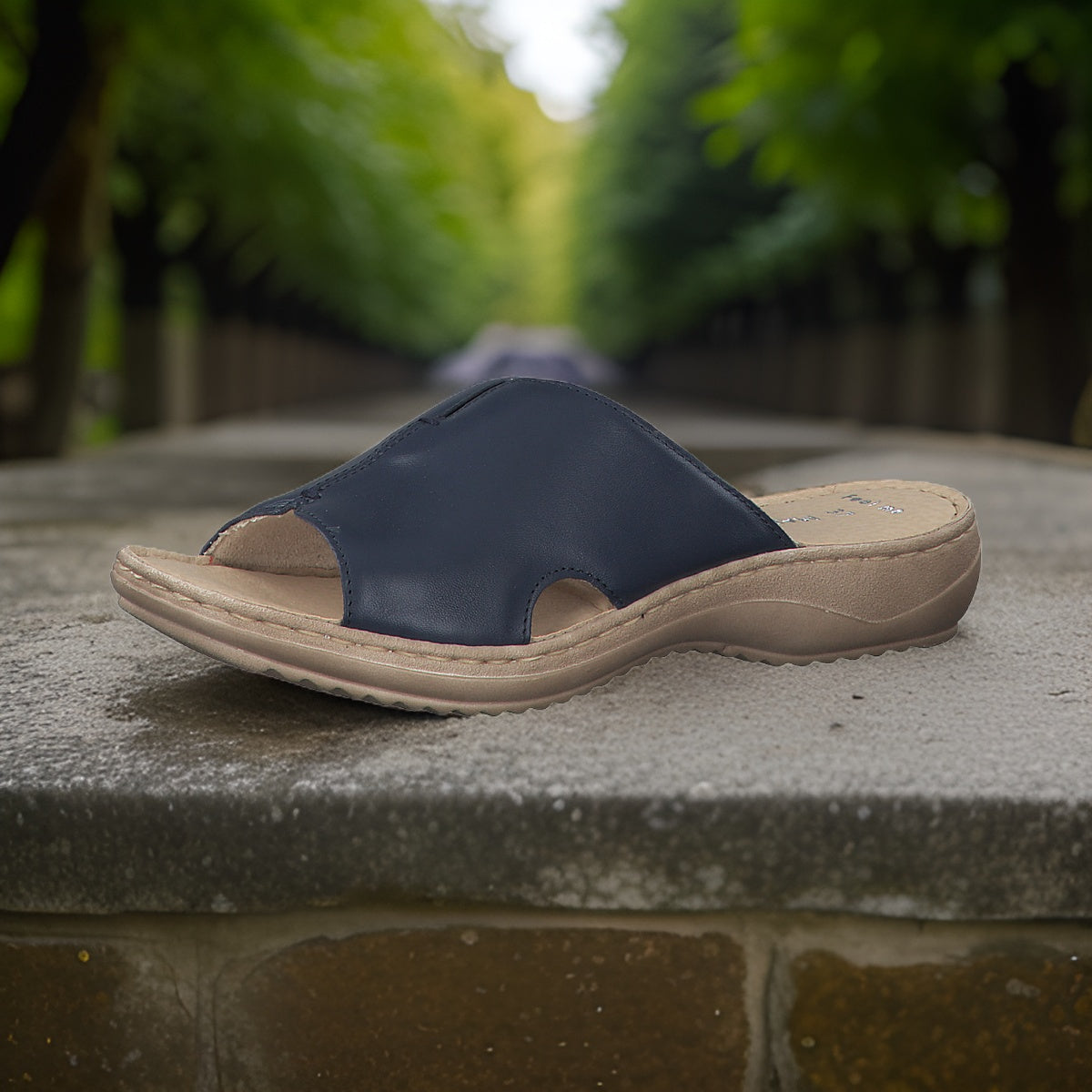 Marco Tozzi Sleek Black Leather Sandal with Elasticated Slip-On Design
