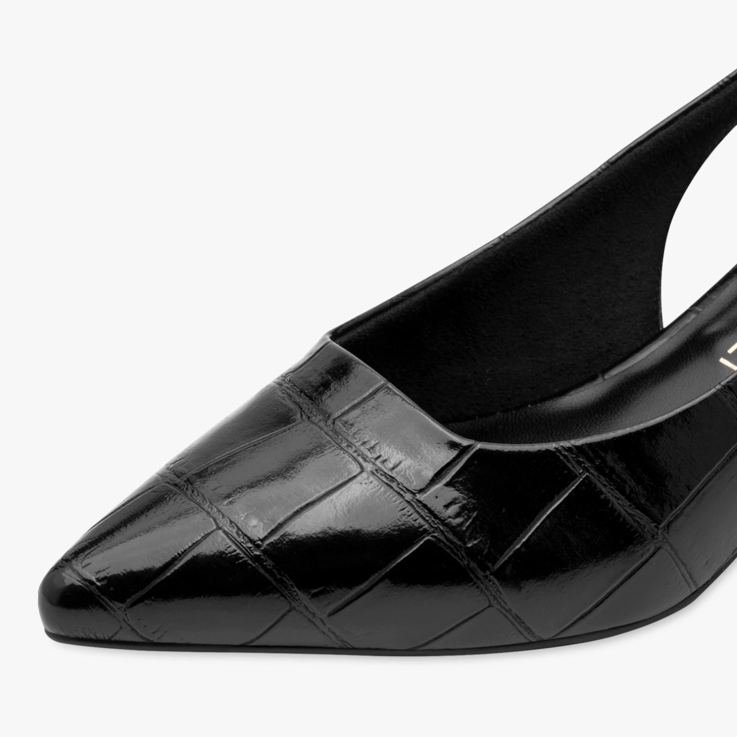 Close-up of the crocodile-effect texture and pointed toe on the Marco Tozzi black slingback.