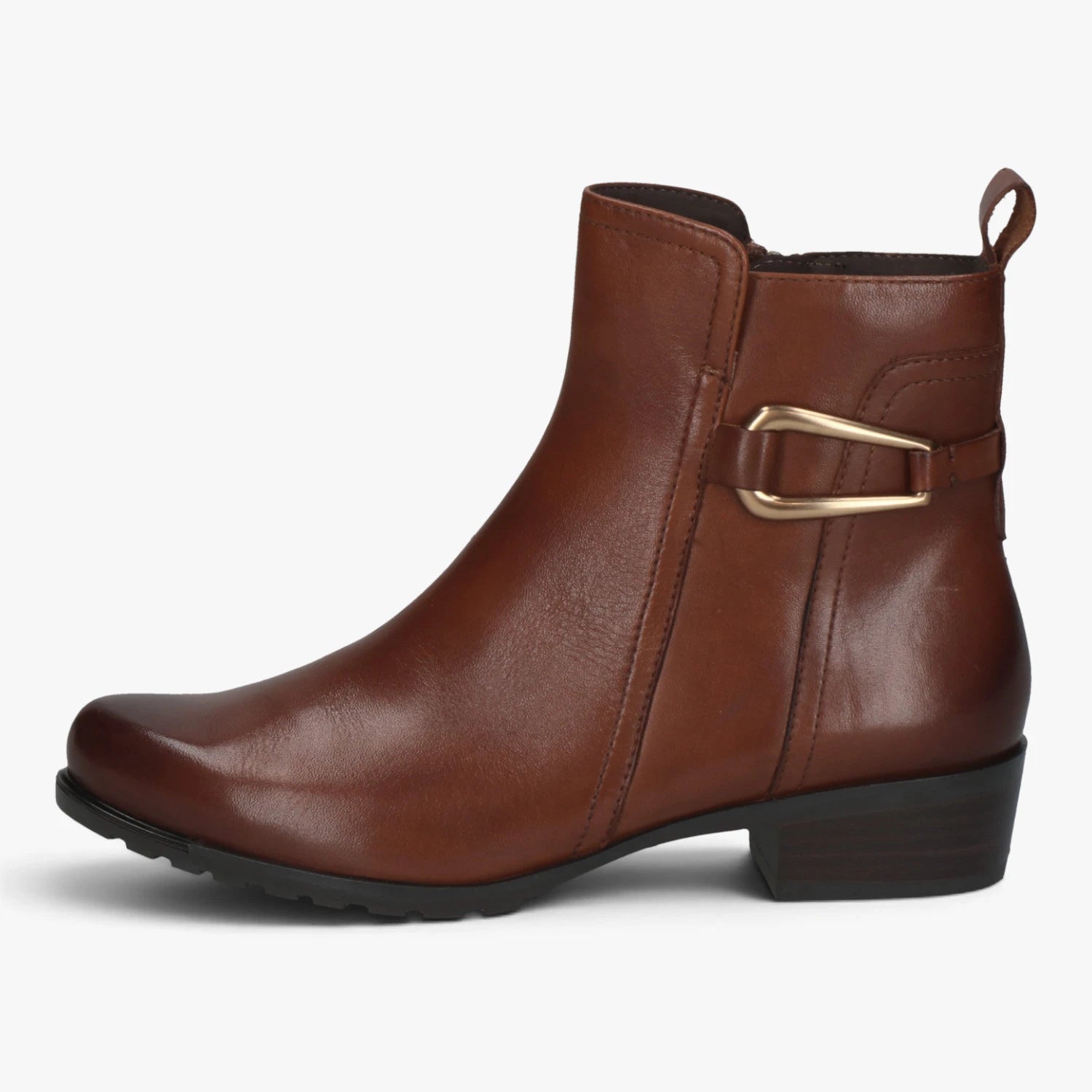 Outer side of the Caprice cognac ankle boot, showing the gold-tone buckle, ankle strap and low block heel.