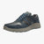 Blue sneaker with a gray sole on a white background
