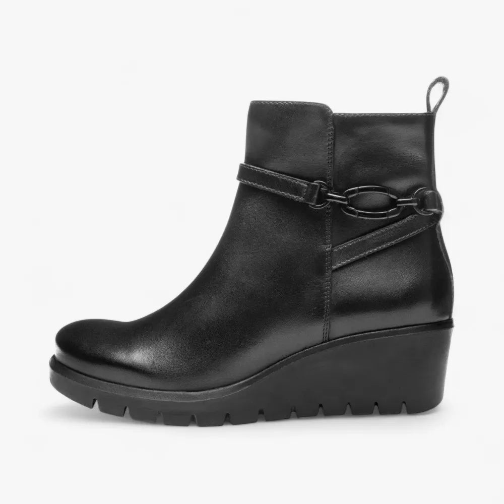 Black wedge ankle boot on a white background