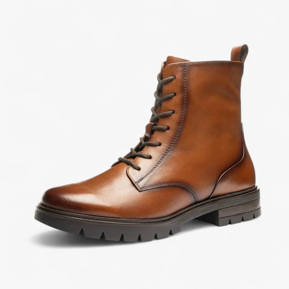 Brown leather boot on a white background