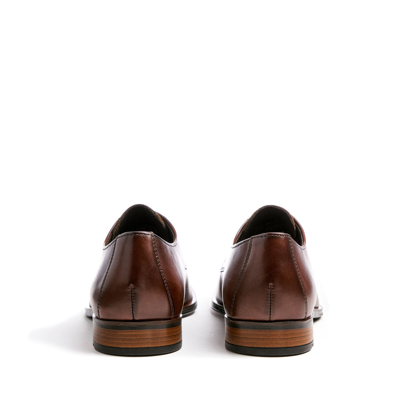 Heel view of the brown formal men's shoes.