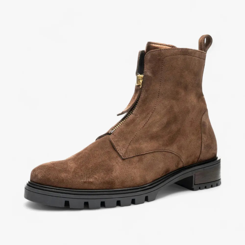 Brown suede boot with a zipper on a white background