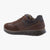 Brown sneaker with black sole on a white background