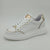 White Trainer with Gold Detailing by Meline