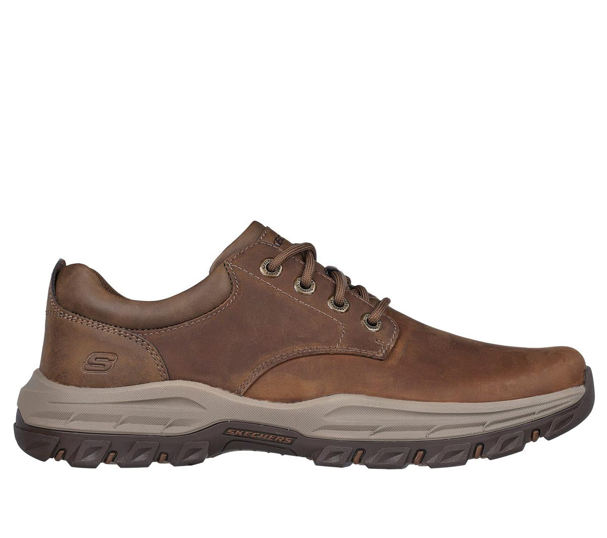 Close-up of the Air-Cooled Memory Foam insole in Skechers brown leather shoes.