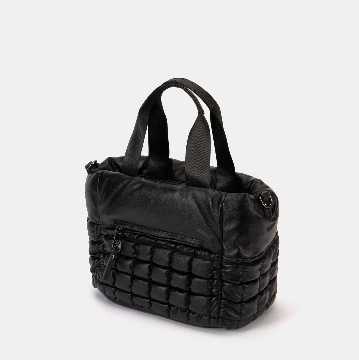 Black quilted handbag on a light gray background