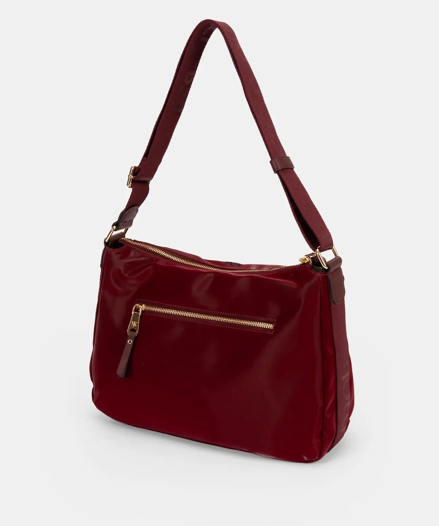 Red handbag with gold zippers on a white background