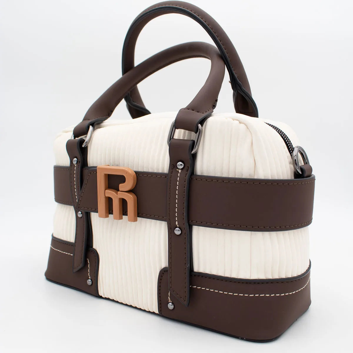 White textured handbag with brown leather straps and decorative buckle on a white background