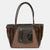 Brown and black handbag with fur-like texture on a white background