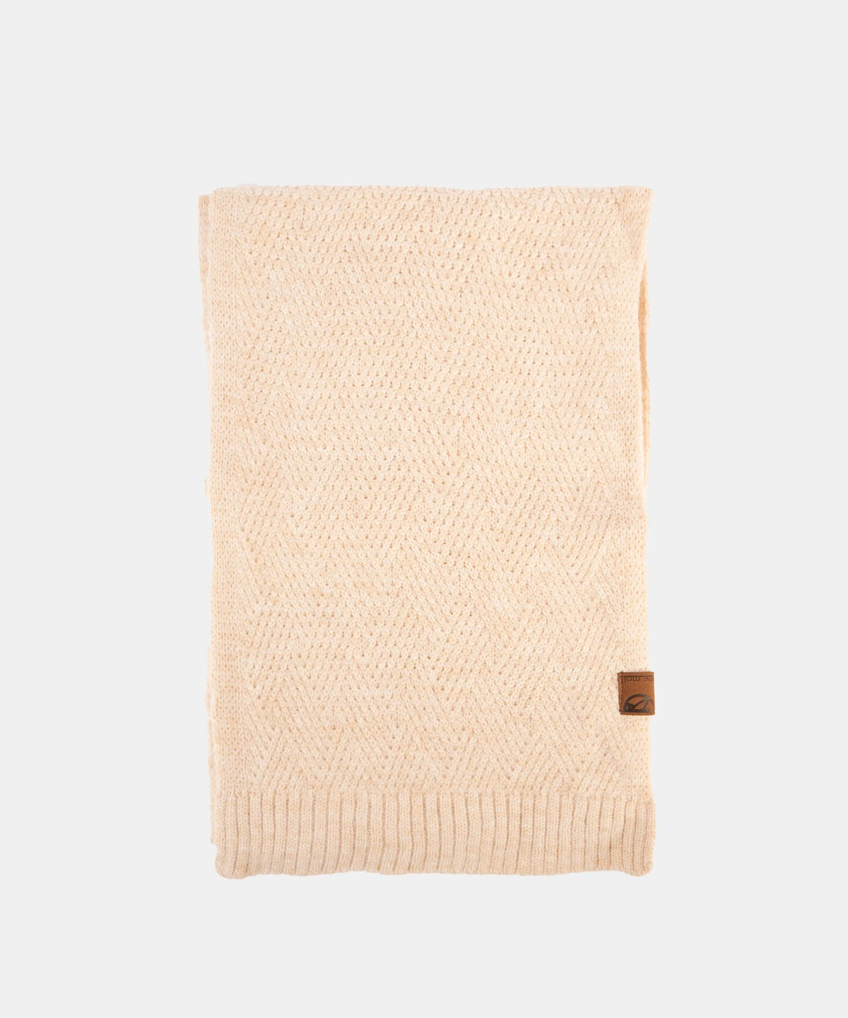 Beige knitted blanket with a brand logo on a white background