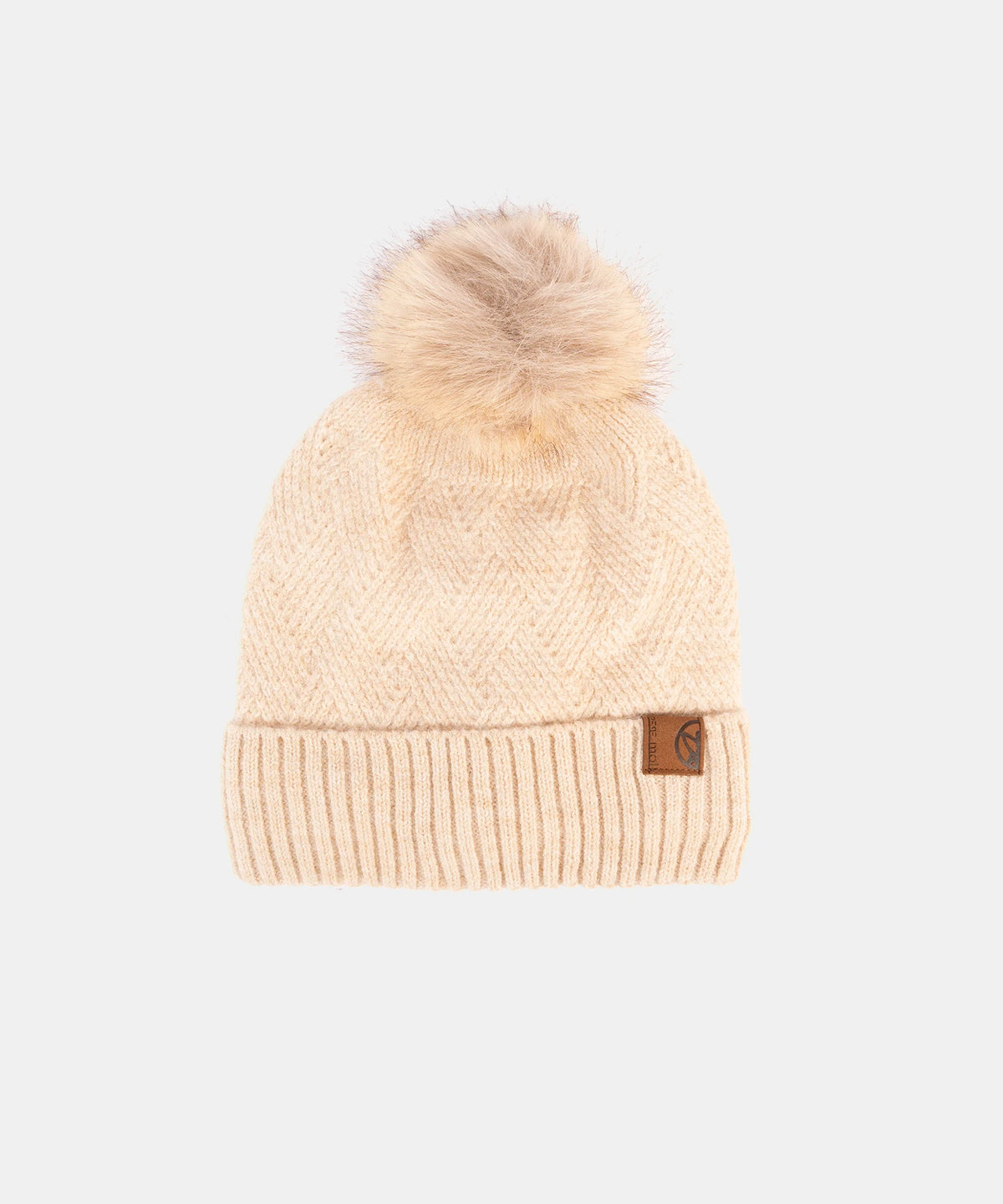 Beige knit beanie with a pom-pom on a white background