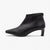 Black ankle boot on a white background