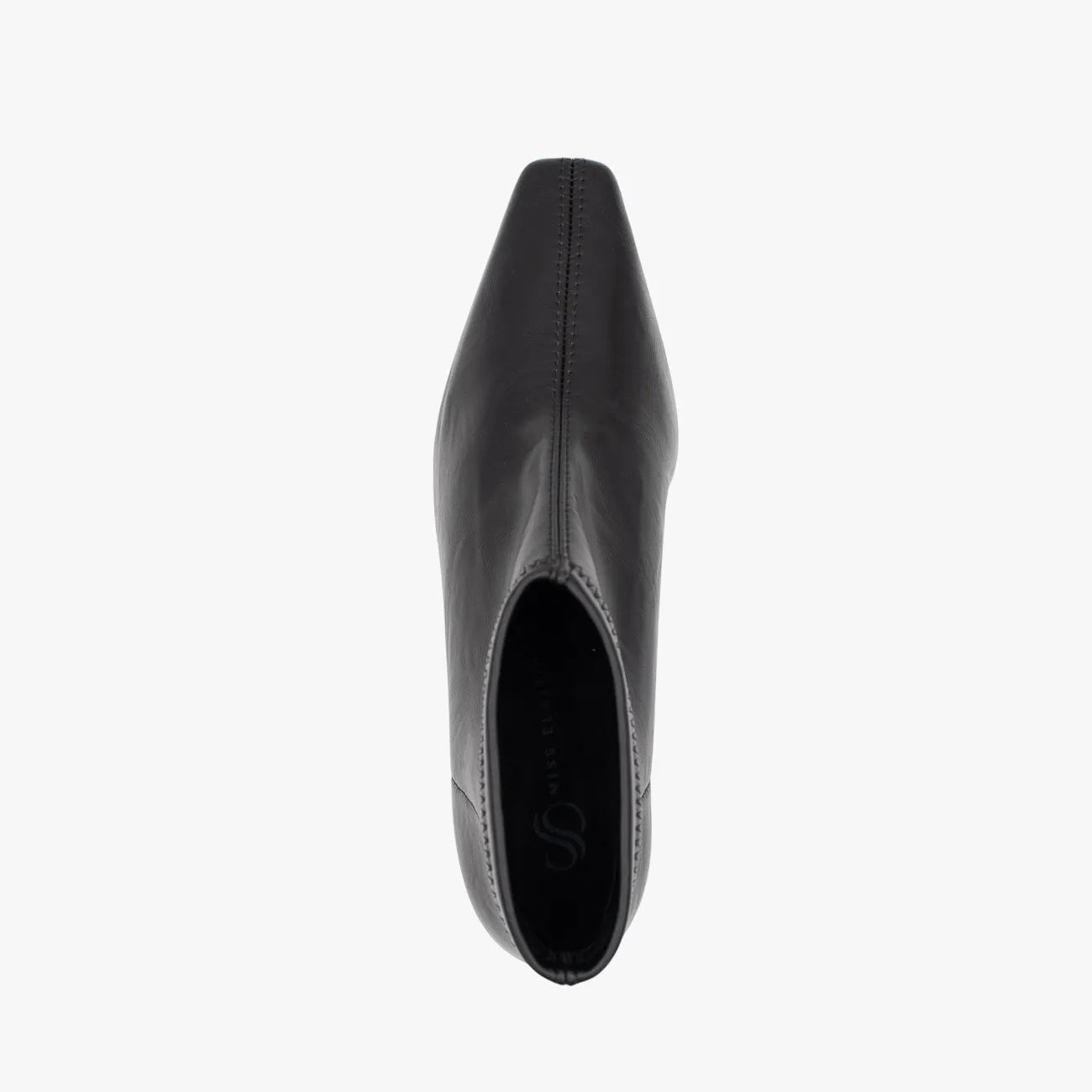 Black leather shoe on a white background