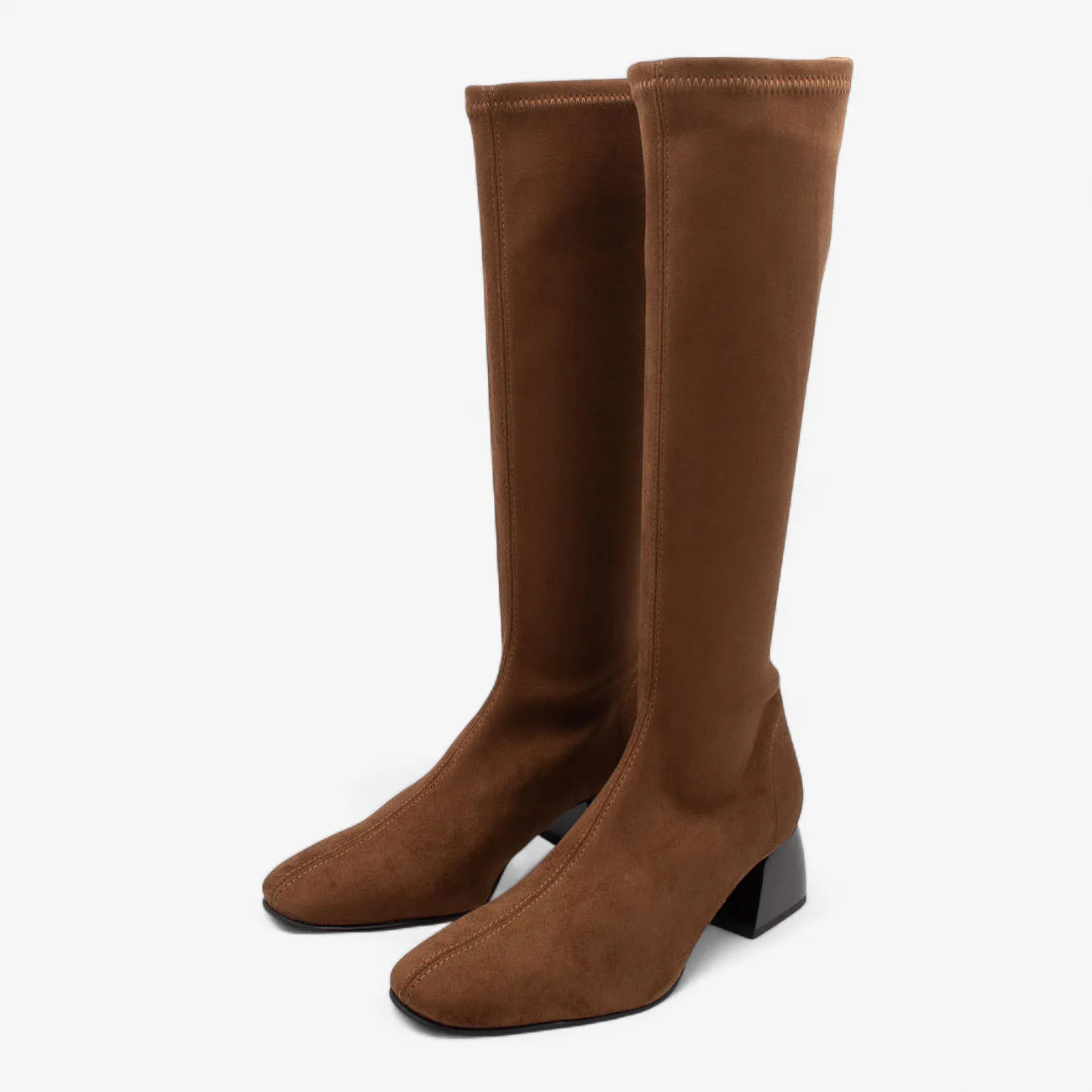 Pair of brown knee-high boots on a white background