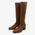 Pair of brown knee-high boots on a white background