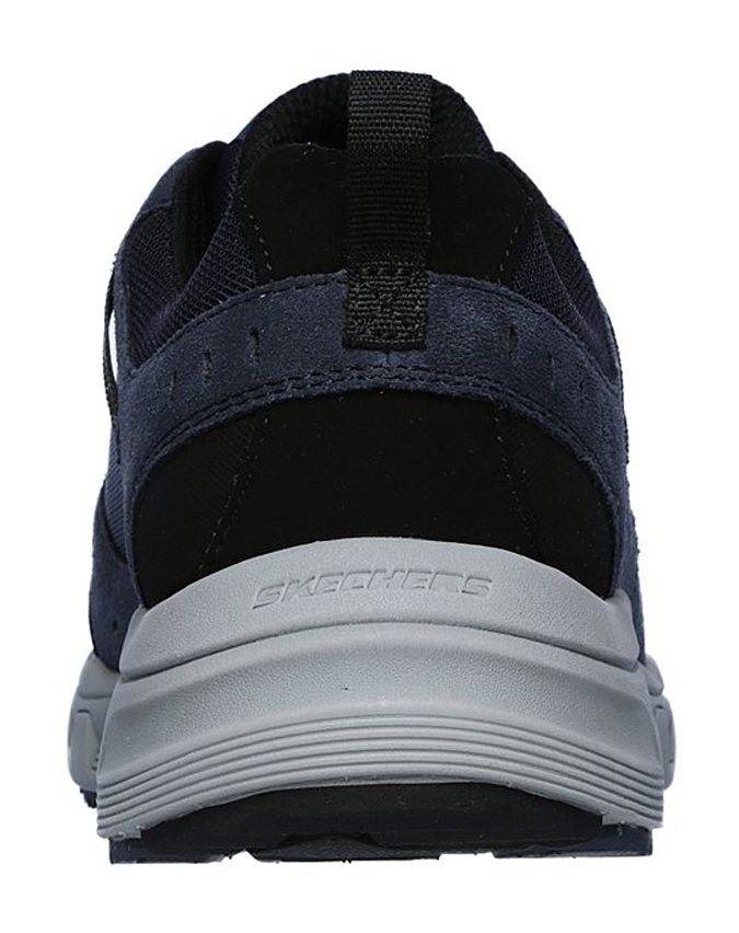 Front angle showing the lace-up design and metal eyelets of the SKECHERS Oak Canyon.