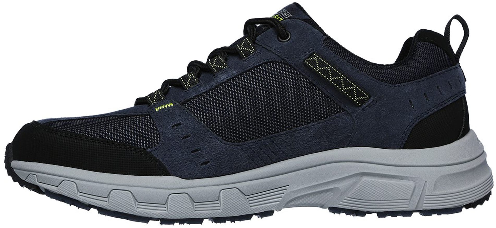 Detailed view of the tough synthetic overlays and cooling mesh panels on SKECHERS sneakers.