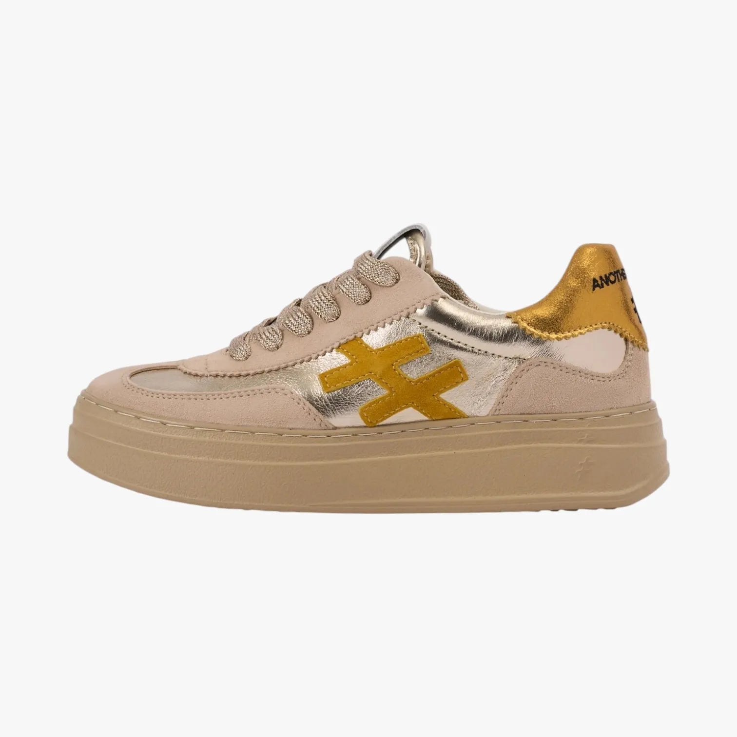 Beige sneaker with gold and white accents on a white background