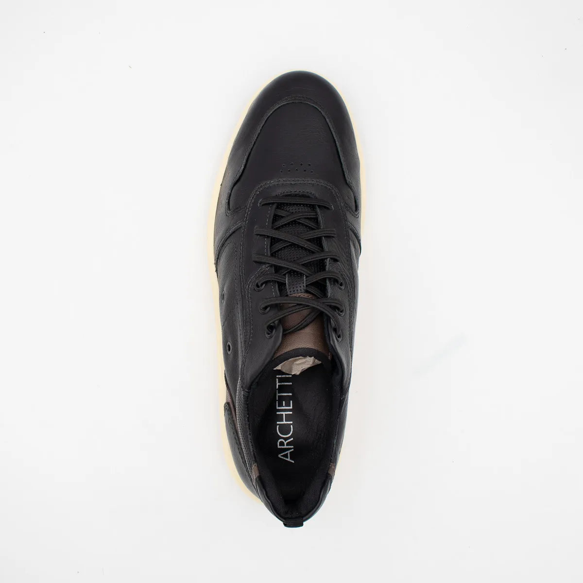 Black sneaker with 'Archetti' branding on a white background