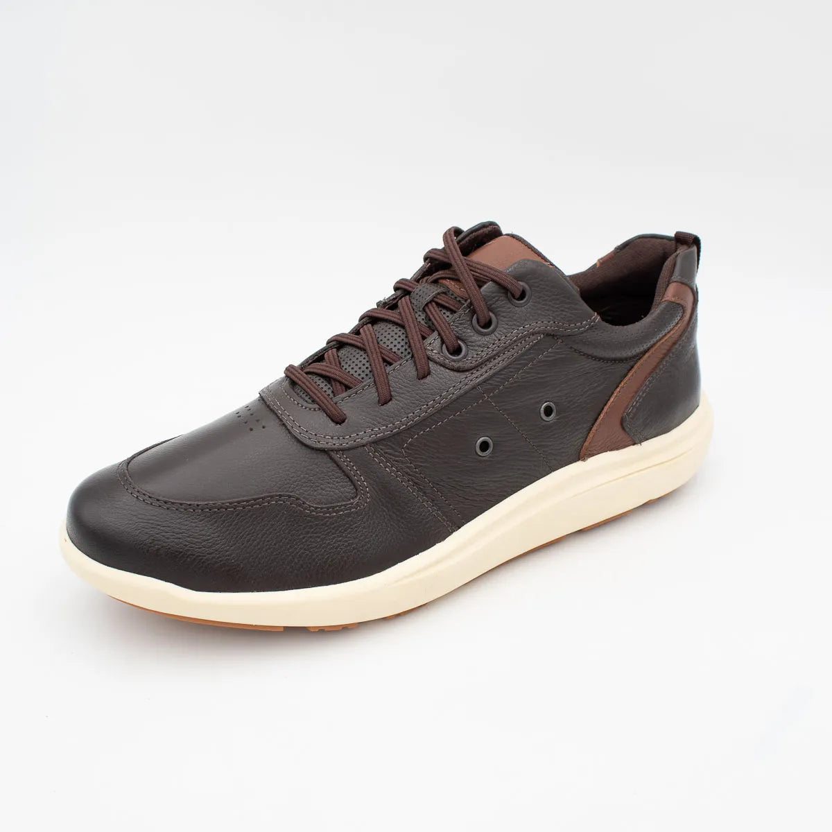 Brown leather sneaker with white sole on a light gray background