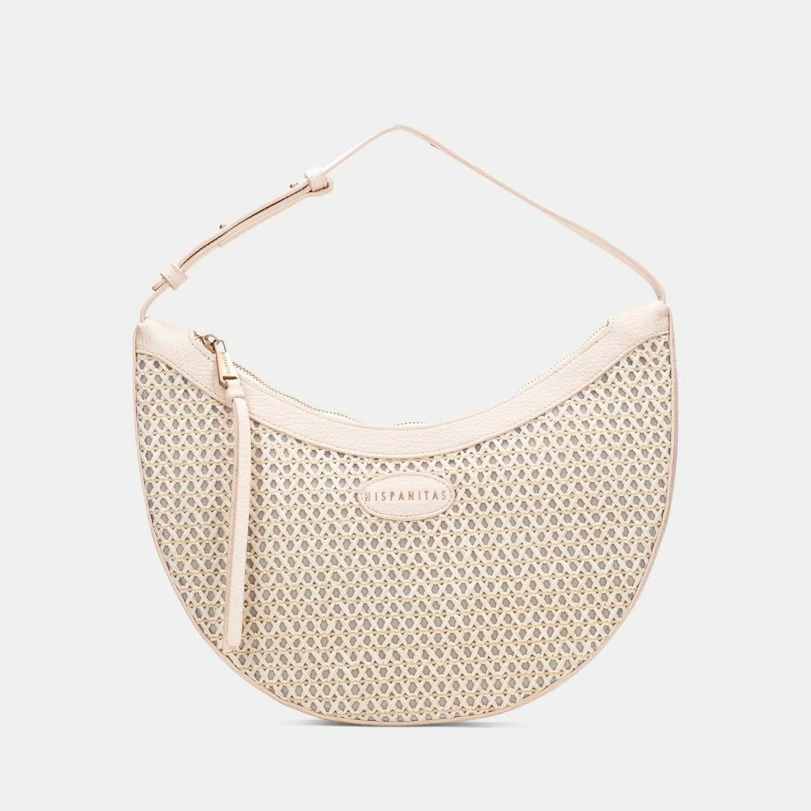 Beige handbag with a textured pattern on a white background