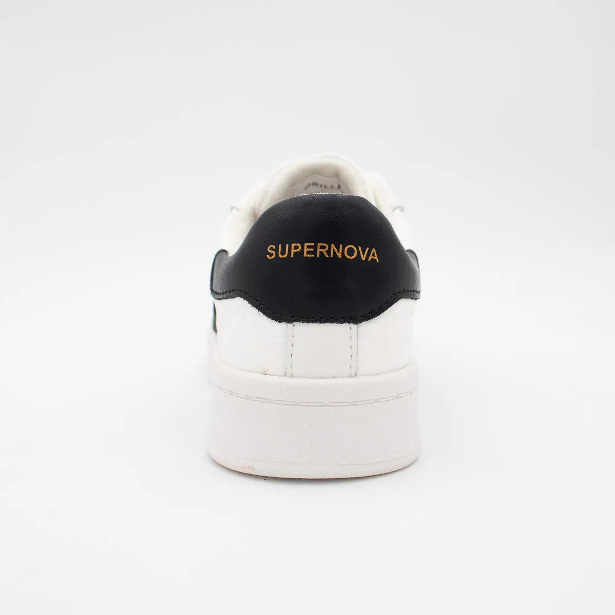 White sneaker with black heel tab and 'Supernova' branding on a white background