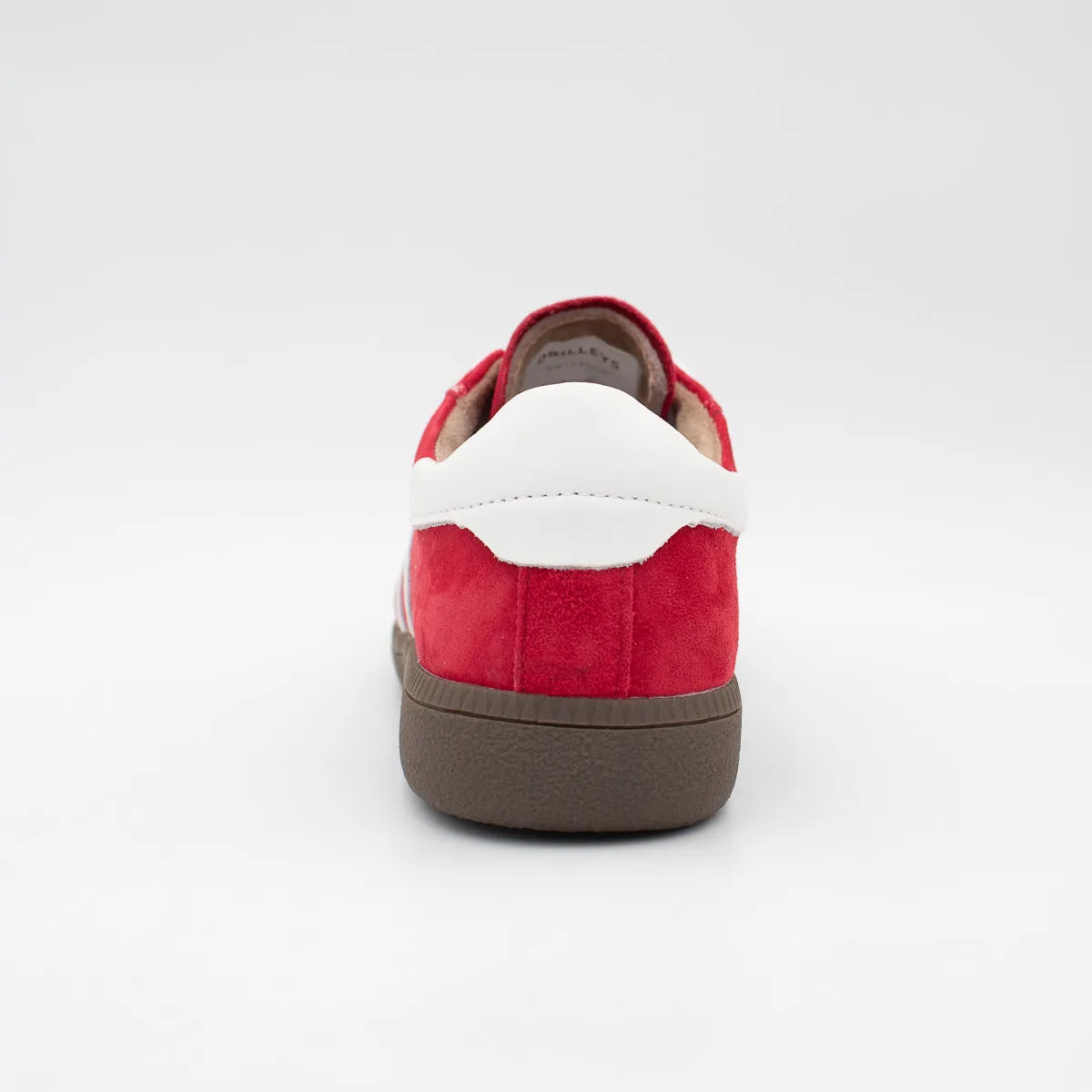 Red and white shoe on a light gray background