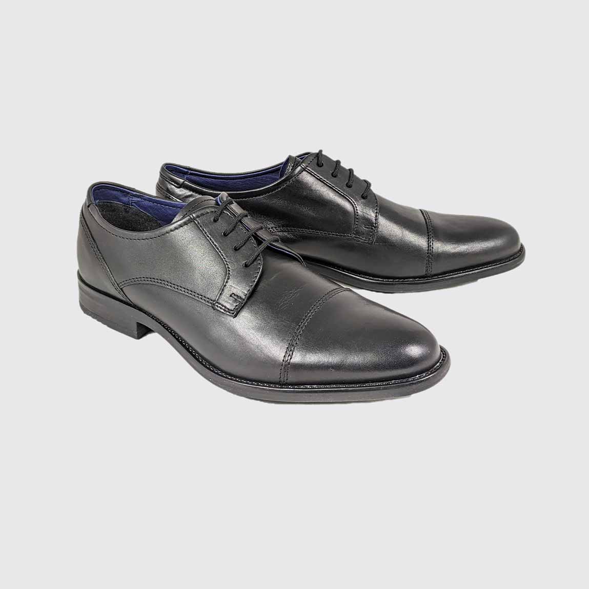 Angled view of the Dubarry Derek Black dress shoe with toe cap.