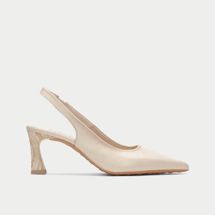 Beige slingback shoe on a light gray background