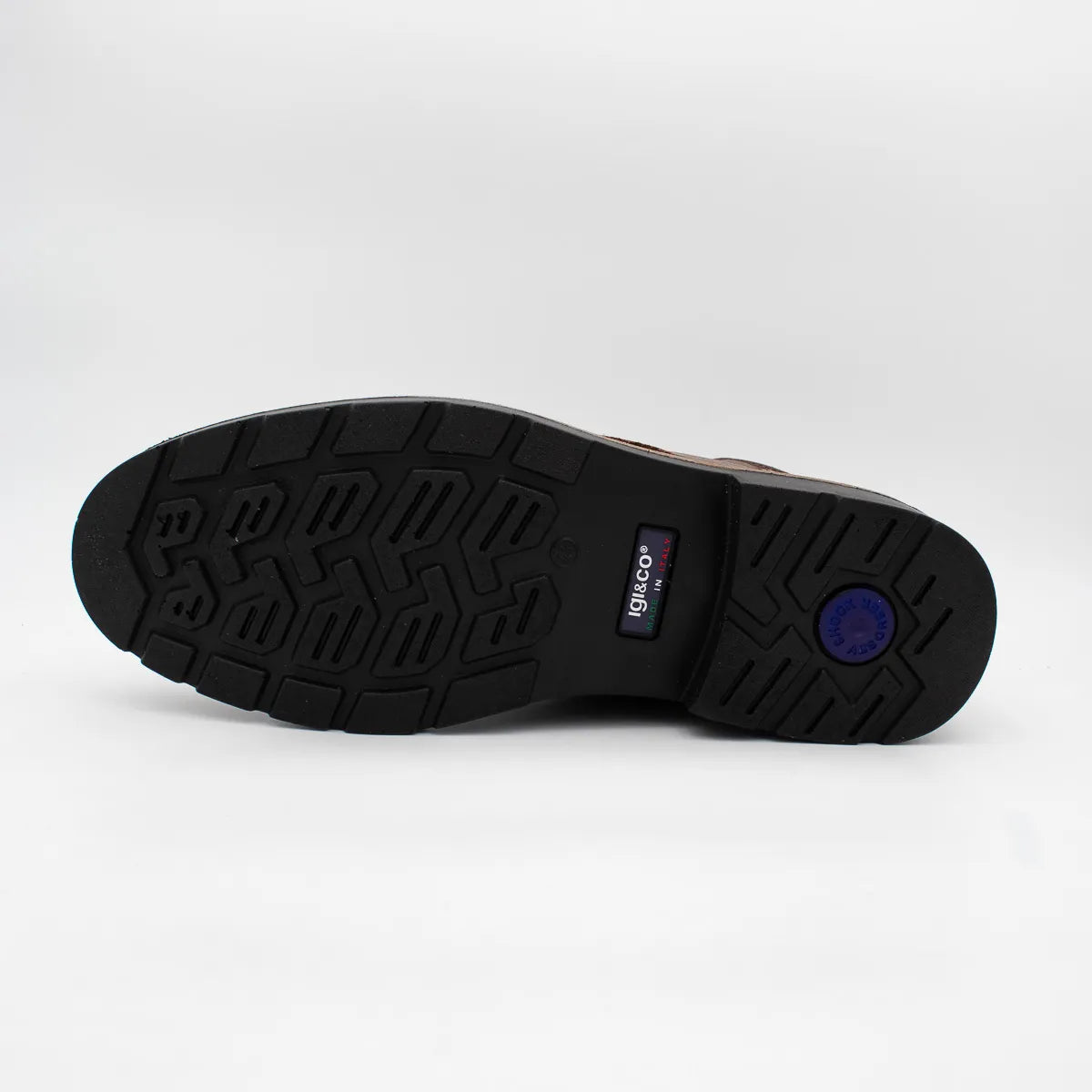 Black sole of a shoe with a visible brand logo on a white background