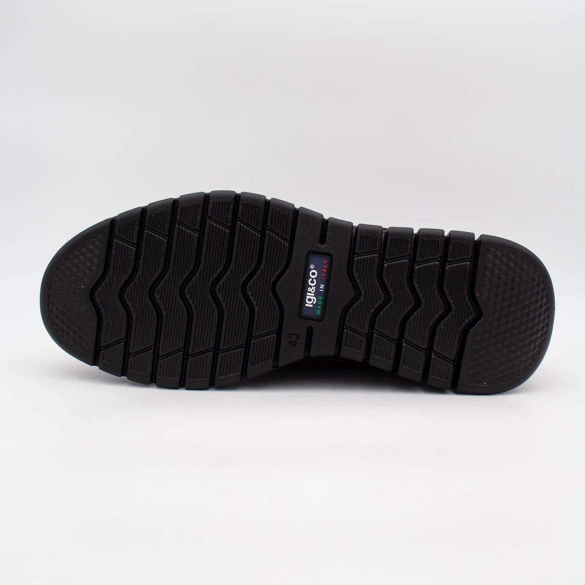 Black shoe sole with brand logo on a white background