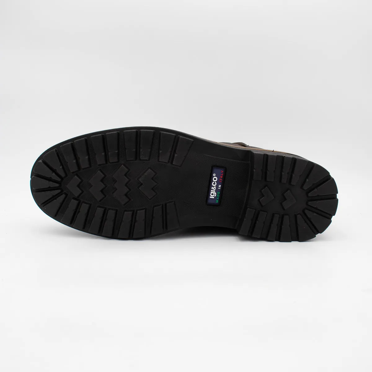 Black boot sole with brand logo on a white background