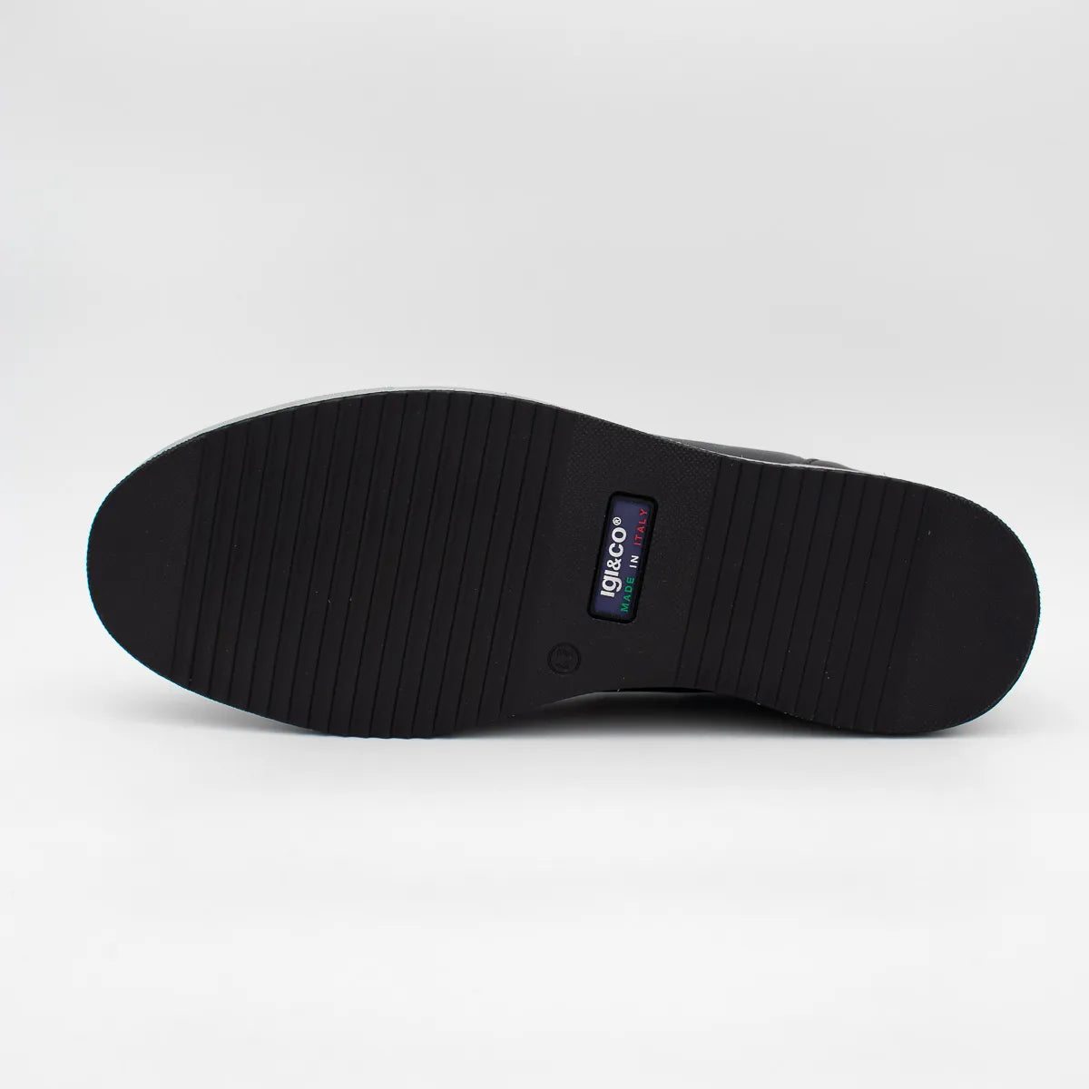 Black shoe sole with a brand logo on a white background